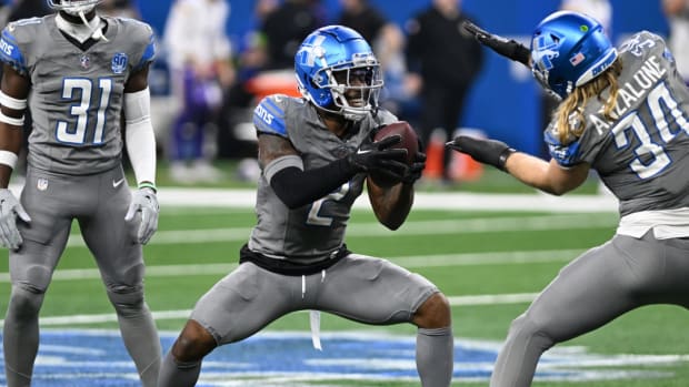 Detroit Lions safety C.J. Gardner-Johnson celebrates an interception.